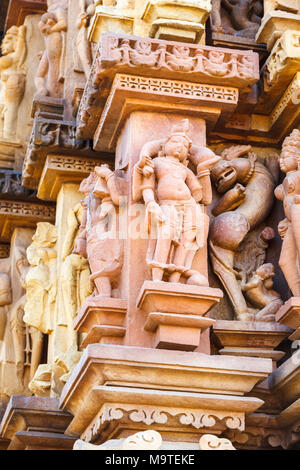 Restored figure carvings in the Hindu Chaturbhuja Temple dedicated to Lord Vishnu Southern Group of Temples, Khajuraho, Madhya Pradesh, India Stock Photo