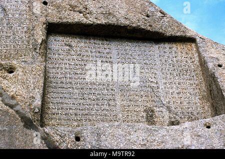 Achaemenid Empire. Ganjnameh. Ancient inscription carved in granite in 3 languages: Old Persian, Neo-Babylonian and Neo-Elamite, written by order of the sovereigns Darius the Great (521-485 BC) and Xerxes the Great (485-65 BC). Cuneiform alphabets. Near Hamedan, Islamic Republic of Iran. Stock Photo