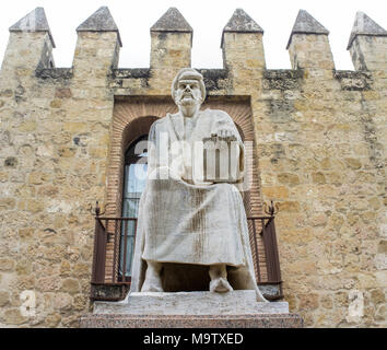 Cordoba, Spain - Dec 31, 2017: Philosopher Averroes Statue made by Pablo Yusti in 1967. Córdoba Walls, Spain Stock Photo