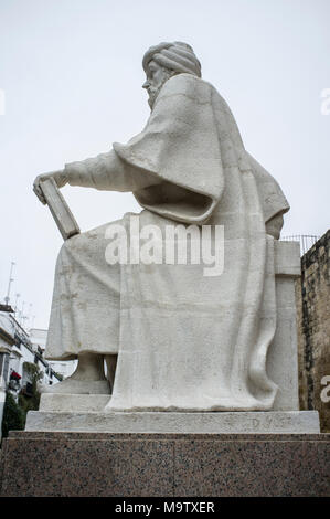 Cordoba, Spain - Dec 31, 2017: Philosopher Averroes Statue made by Pablo Yusti in 1967. Córdoba, Spain. Side view Stock Photo