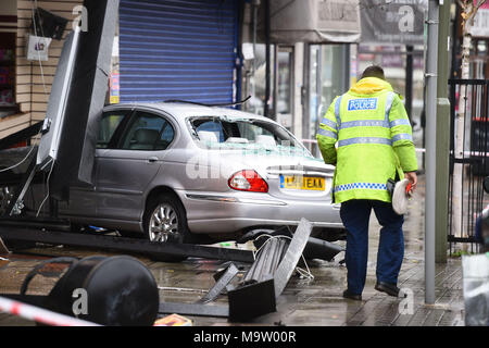 NUMBERPLATE PIXELATED BY PA PICTURE DESK A car on its side in a ditch ...