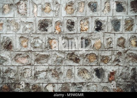 Grey worn peeled concrete wall texture. Industrial background. Vintage effect. Copy space. Stock Photo
