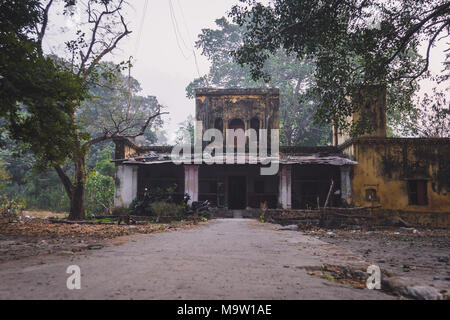 An Old House in Disrepair. two-story old abandoned mansion. The house of a poor family Stock Photo