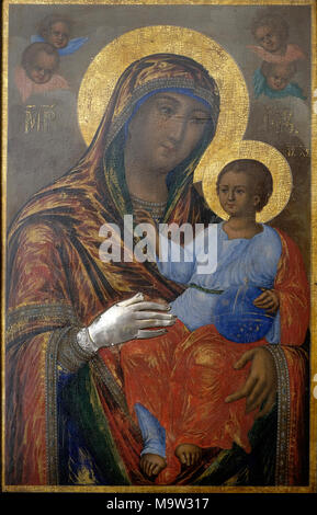 Icon figure depicting baby Jesus and Mary at the iconostasis of the Greek Orthodox Chapel of St John and baptistry in which Arab Christians pray located next to the Church of the Holy Sepulcher, on the Western wall of the square.in the Christian Quarter old city  East Jerusalem Israel Stock Photo