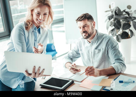 Joyful partners discussing their plan Stock Photo