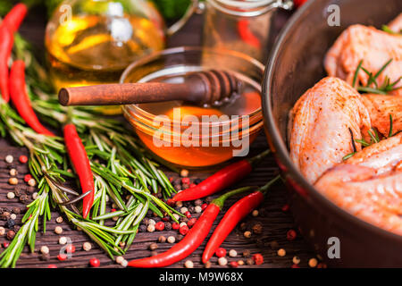 Chickens wings covered in honey, vegetables Stock Photo