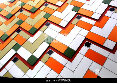 on the wall of multi-colored ceramic tiles Stock Photo
