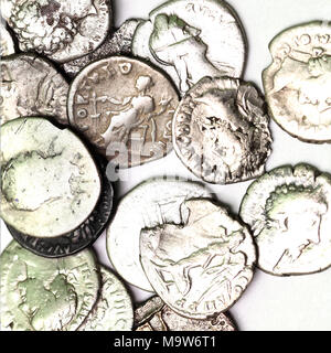 Old roman coins on a white background. Denaria Stock Photo