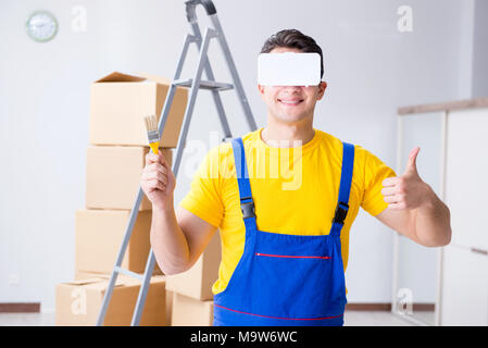 Painter contractor working with virtual reality goggles Stock Photo