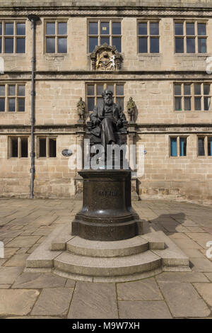Bronze statue of Charles Robert Darwin outside the county library in Shrewsbury England erected in 1897 Stock Photo