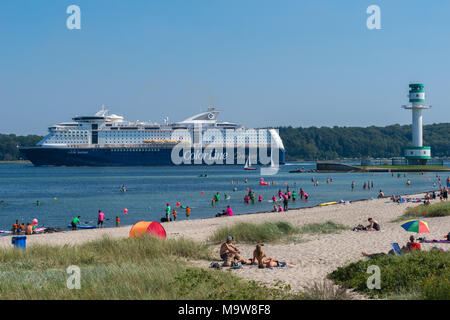 Summertime at the Kiel Fjord. People having fun sunbathing on Falckenstein Beach, Kiel, Schleswig-Holstein, Germany, Europe Stock Photo