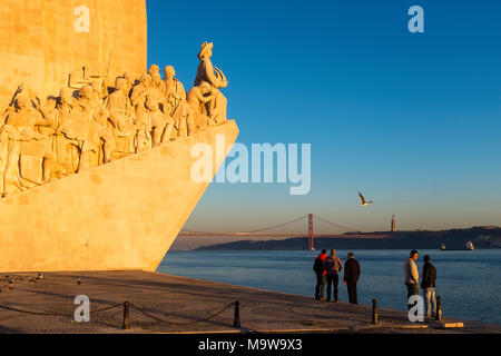 Lisbon, Portugal - January 10, 2017: People enjoying the sunset near the Monument to the Discoveries (Padrao dos Descobrimentos) in the city of Lisbon