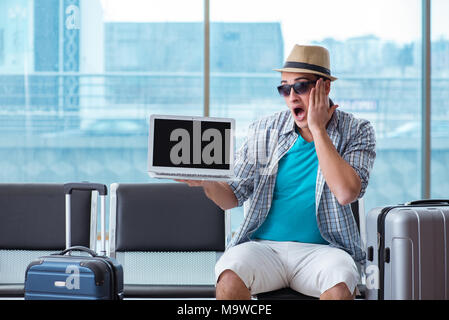 Young man travelling for his summer beach vacation Stock Photo
