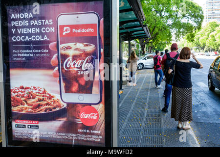 Buenos Aires Argentina,Palermo,Avenida del Libertador,bus stop,shelter,man men male,woman female women,standing,ad,Coca-Cola Zero,Spanish language,His