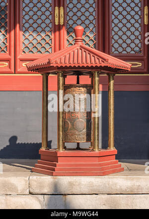 BEIJING-SEPTEMBER 19, 2009. Big copper bell at Yonghe Lamasery, also known as the Lama Temple. It is a temple and monastery of the Gelug school. Stock Photo