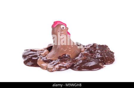 Melting chocolate easter chicken - Isolated on white background Stock Photo