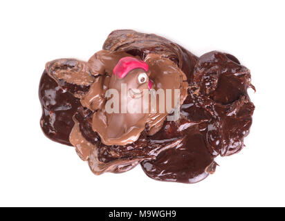 Melting chocolate easter chicken - Isolated on white background Stock Photo