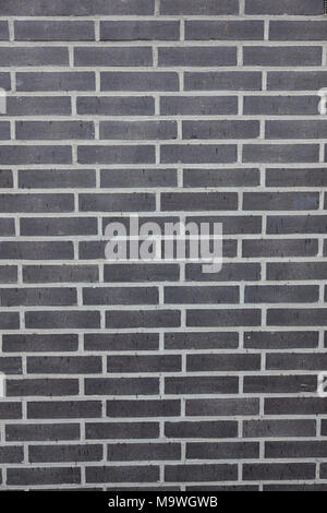 background consisting of part of anthracite brick wall Stock Photo