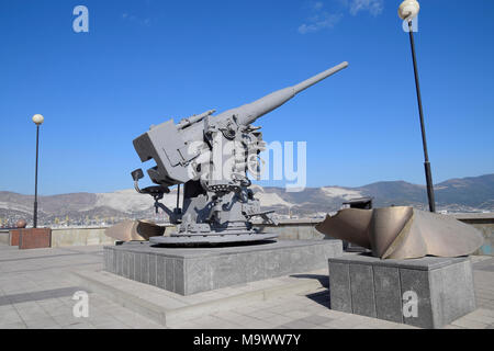 Artillery battle cannon, raised from the bottom of the Black Sea. Weapons of defense in the Second World War. The restored exhibit. Stock Photo