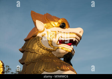 Colorful lion at the entrance to the Golden Rock temples in Kyaiktiyo Stock Photo