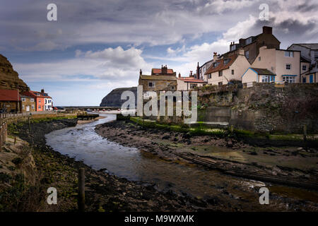 View of Staithes Beck and Staithes former fishing village on the North Yorkshire Coast in the North York Moors National Park Stock Photo