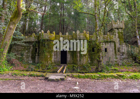 The well preserved remains of a castle near a medieval aqueduct - Aldan - Galicia, Spain Stock Photo