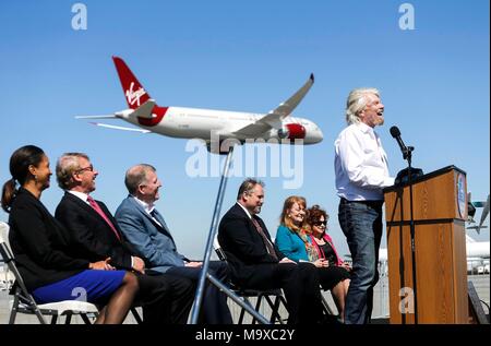 Los Angeles, USA. 28th Mar, 2018. Richard Branson (1st R), founder of the Virgin Group, speaks as he is inducted into the Flight Path Walk of Fame at Los Angeles International Airport in Los Angeles, the United States, March 28, 2018. Credit: Zhao Hanrong/Xinhua/Alamy Live News Stock Photo