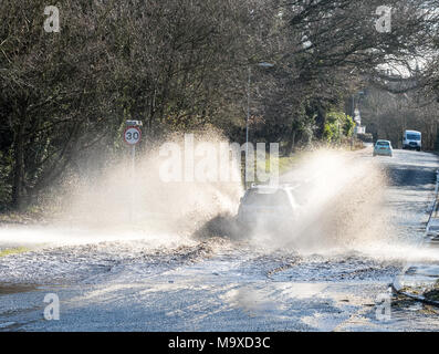 Essex. 29th March 2018. UK Weather: Heavy Rain has caused localised road  flooding in Brentwood Essex and motorists struggle to drive through the flood or turn back to avoid the flood. Credit Ian Davidson/Alamy live news Stock Photo