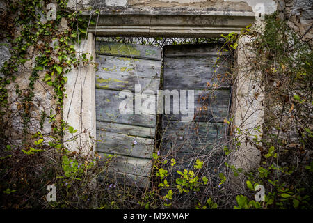 Old abandoned and decayed houses, extinct village on Peljesac peninsula, Croatia Stock Photo