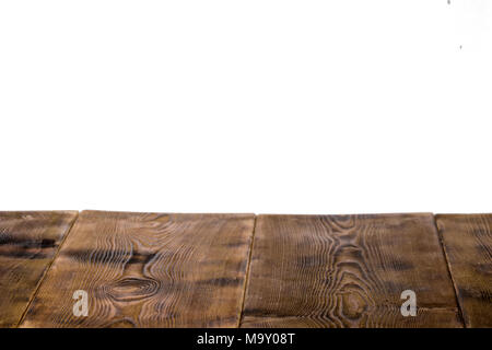 empty wooden table top isolated on white background, used for display or montage your products Stock Photo