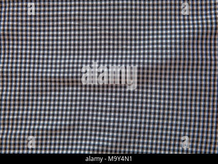 Grey and white checkered fabric texture background. Stock Photo