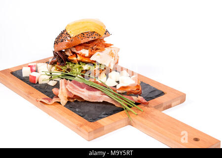Delicious burger studio shot with bacon on a white background Stock Photo