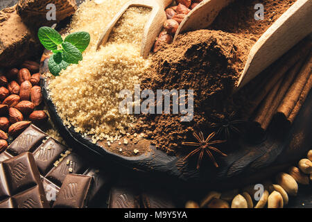 Cocoa powder, chocolate, nuts and spices Stock Photo
