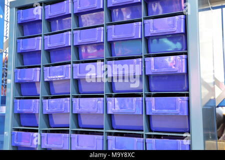 Plastic drawer for keeping parts in factory Stock Photo