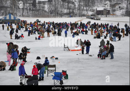 Kids ice fishing competition Stock Photo - Alamy