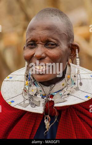 Portrait of a Maasai Woman from Kenya with Colorful African Bead Necklace Jewelry around her Neck Stock Photo