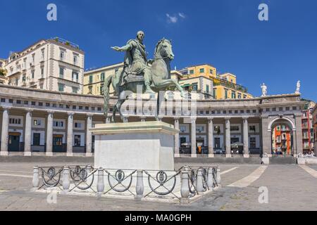Bronze statue of King Ferdinand I of Bourbon in Piazza del Plebiscito in Naples, Italy. Stock Photo