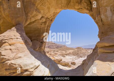 The big natural rock arch formation and desert view in Timna National Park, Israel. Stock Photo