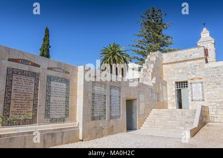 The atrium in Church of the Pater Noster on Mount of Olives with the Prayer in lot of languages, Jerusalem, Israel. Stock Photo