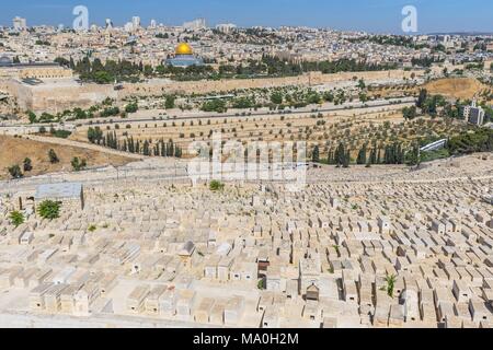 Jerusalem old city and the ancient Jewish cemetery in the Olive mountain, Israel. Stock Photo