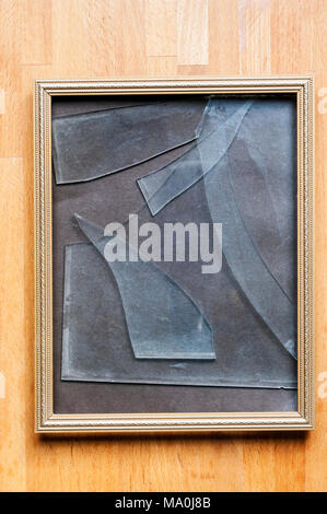 Broken glass in picture frame. Stock Photo