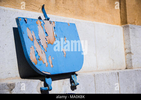 Blue old fold-able street chair at Neuchâtel Switzerland Stock Photo