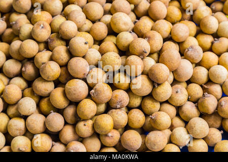 Longan or raw longan fruits on he market. Stock Photo
