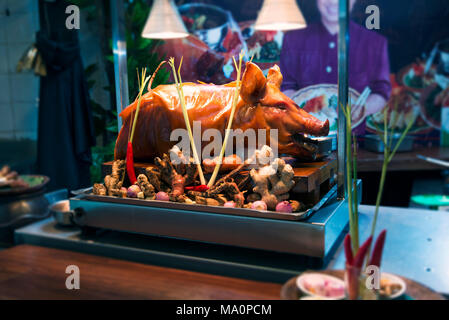 Babi guling cooked pork on the showcase. Stock Photo