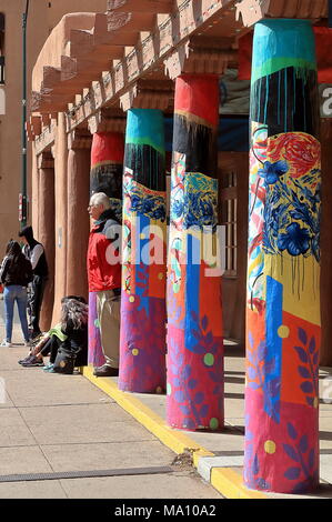 Santa Fe, New Mexico - March 18, 2018: Painted columns in the downtown plaza in Santa Fe New Mexico. Stock Photo