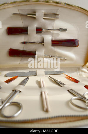 A vintage manicure set in an open case Stock Photo