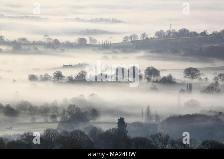 A misty morning view from Titterstone Clee hill, Shropshire, looking towards Worcestershire. Stock Photo