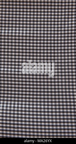 Grey and white checkered fabric texture background. Stock Photo