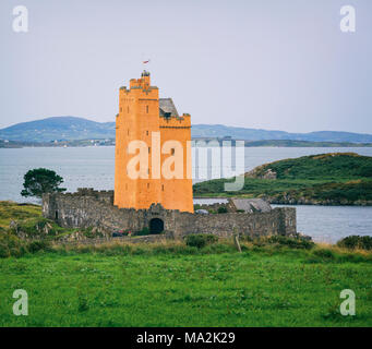 Kilcoe Castle, at Roaringwater Bay near Ballydehob, County Cork, Ireland.  The castle was originally built in the 15th century, and most recently rest Stock Photo