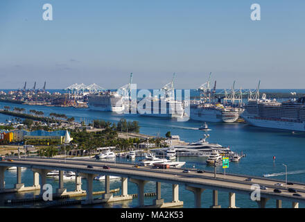 Four Luxury Cruise Ships Docked in Port of Miami Stock Photo